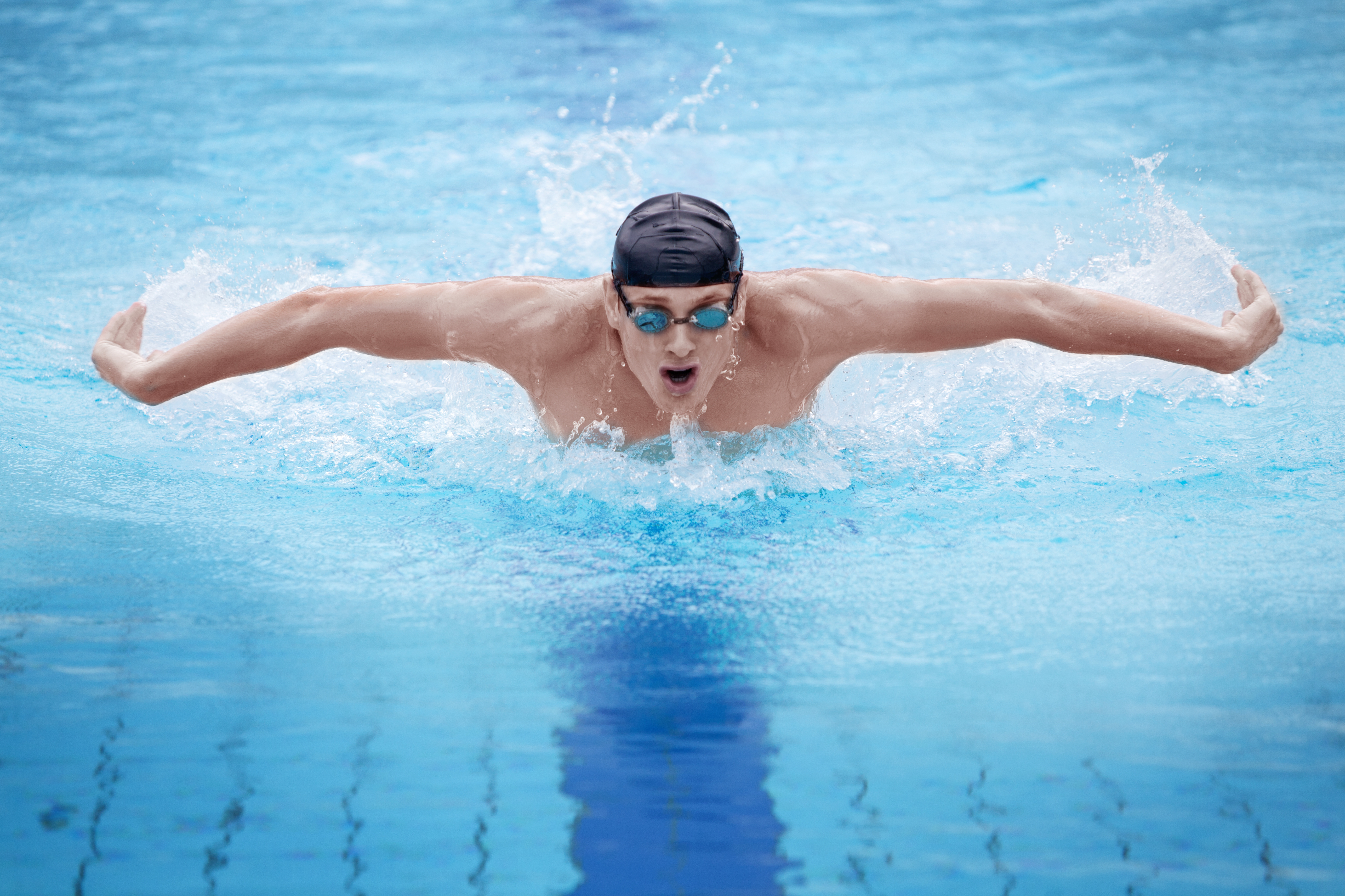 Better swimming. Плавание брасс Баттерфляй. Пловец в бассейне Баттерфляй. Путин Баттерфляй бассейн. Пловчиха баттерфляем.